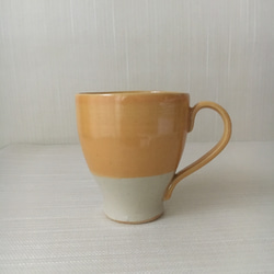 オレンジ釉カップ 1枚目の画像