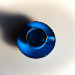 天藍色的杯子和碟子 第4張的照片
