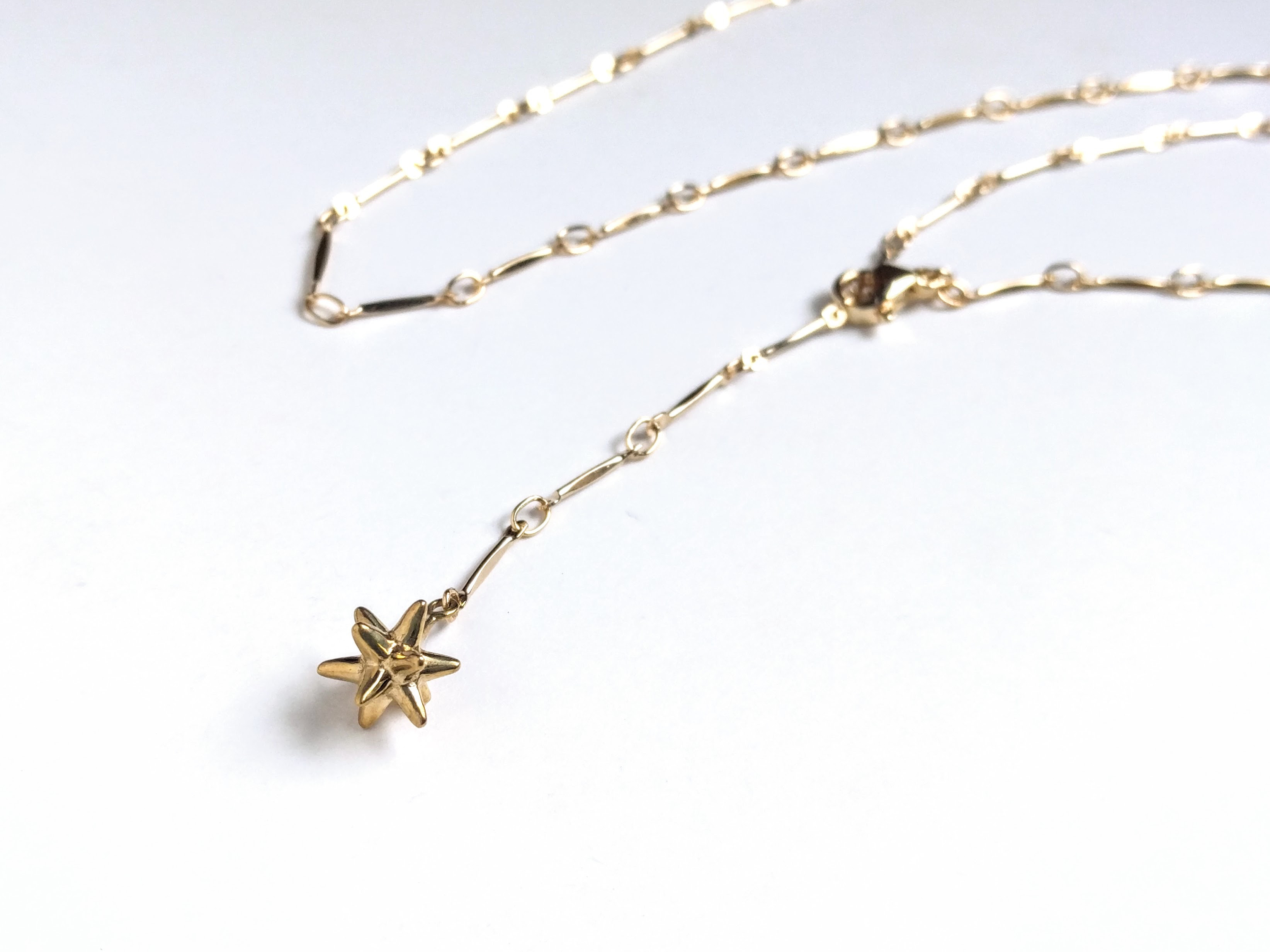 星のかけらのY字ネックレス ネックレス・ペンダント Tomokawa