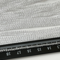 KB201  極小 クリアー 2mm 2本入り 1連約36cm ガラス ビーズ ボタンカット クリスタル 手芸材料 1枚目の画像