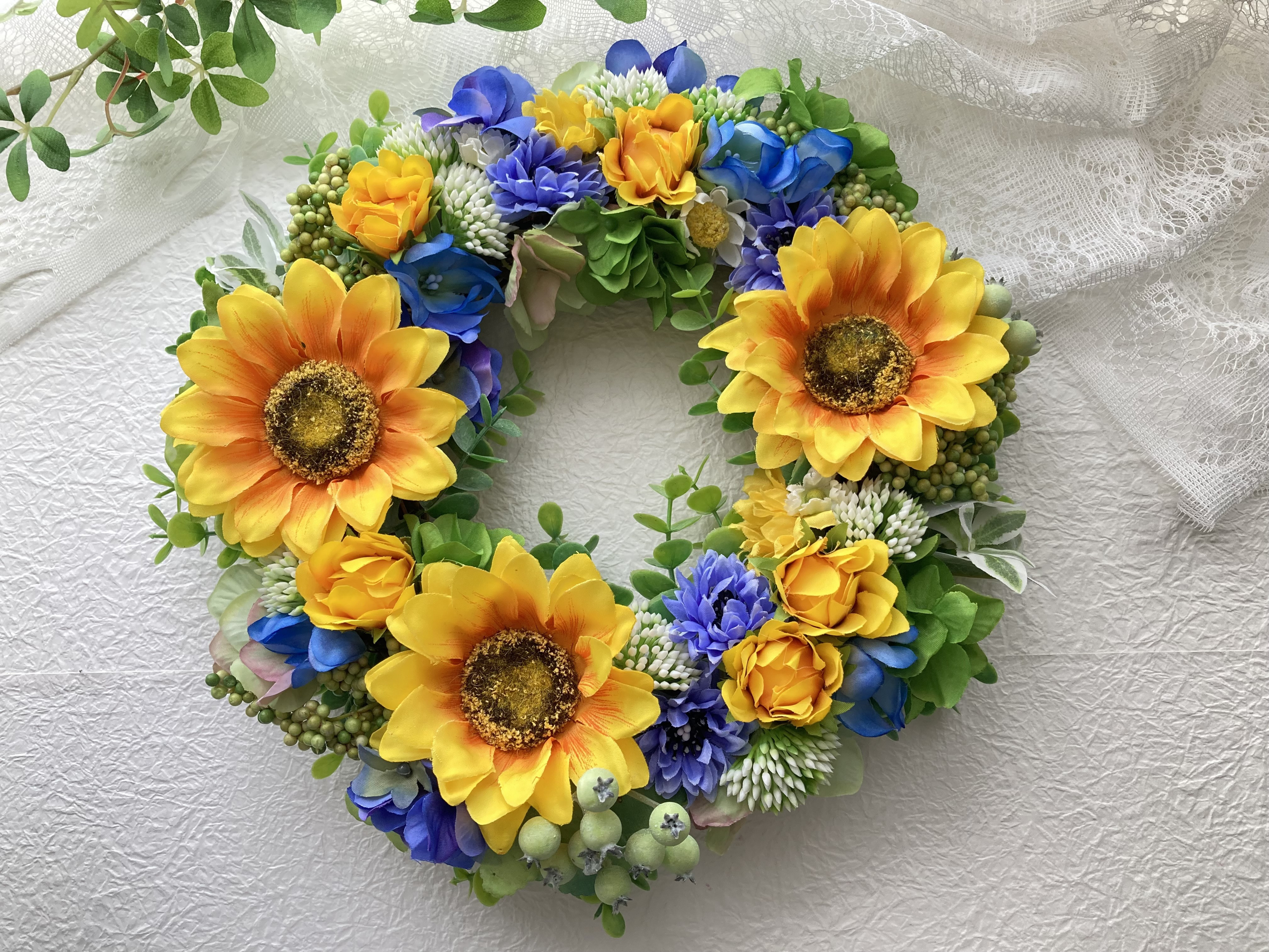 夏到来向日葵リース アーティフィシャルフラワー 元気のでる爽やかイエローブルーグリーン 母の日ギフト敬老の日 誕生日