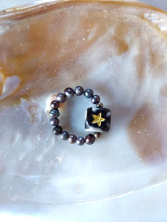 可愛らしい小さな星回紋珠さんのリング、指輪 3枚目の画像