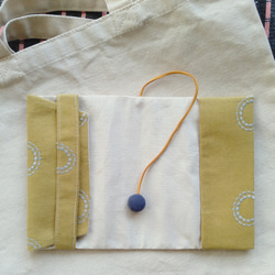 ミシン刺繍布のブックカバー(輪） 4枚目の画像