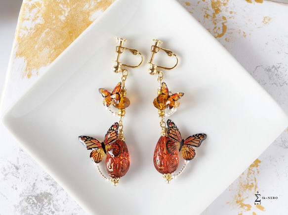 耳飾り アッサムの雫とオレンジ蝶々 ミューラー型擬態 〈 イヤリング , ピアス 〉 5枚目の画像