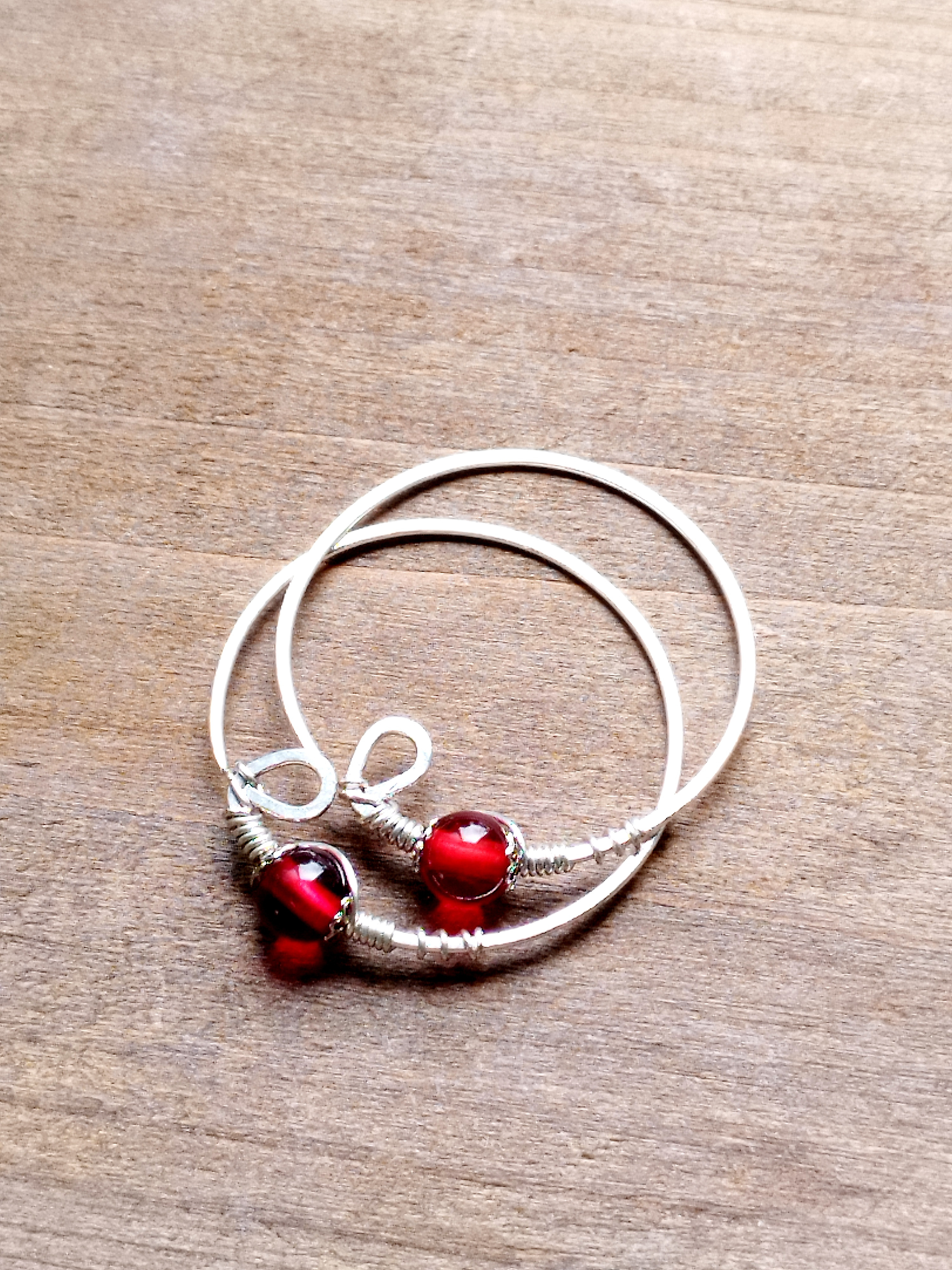 紅い琥珀のニンカリ【アイヌの耳飾り・ピアス】リトアニア産赤琥珀