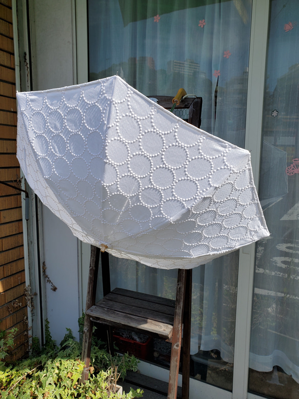 ミナペルホネンハンドメイドUVカット折り畳み日傘収納袋付き 1枚目の画像