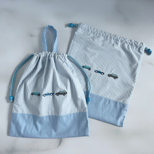 名入れ【サイズが選べる】紺色・車刺繍・巾着袋 男の子 ネイビー お