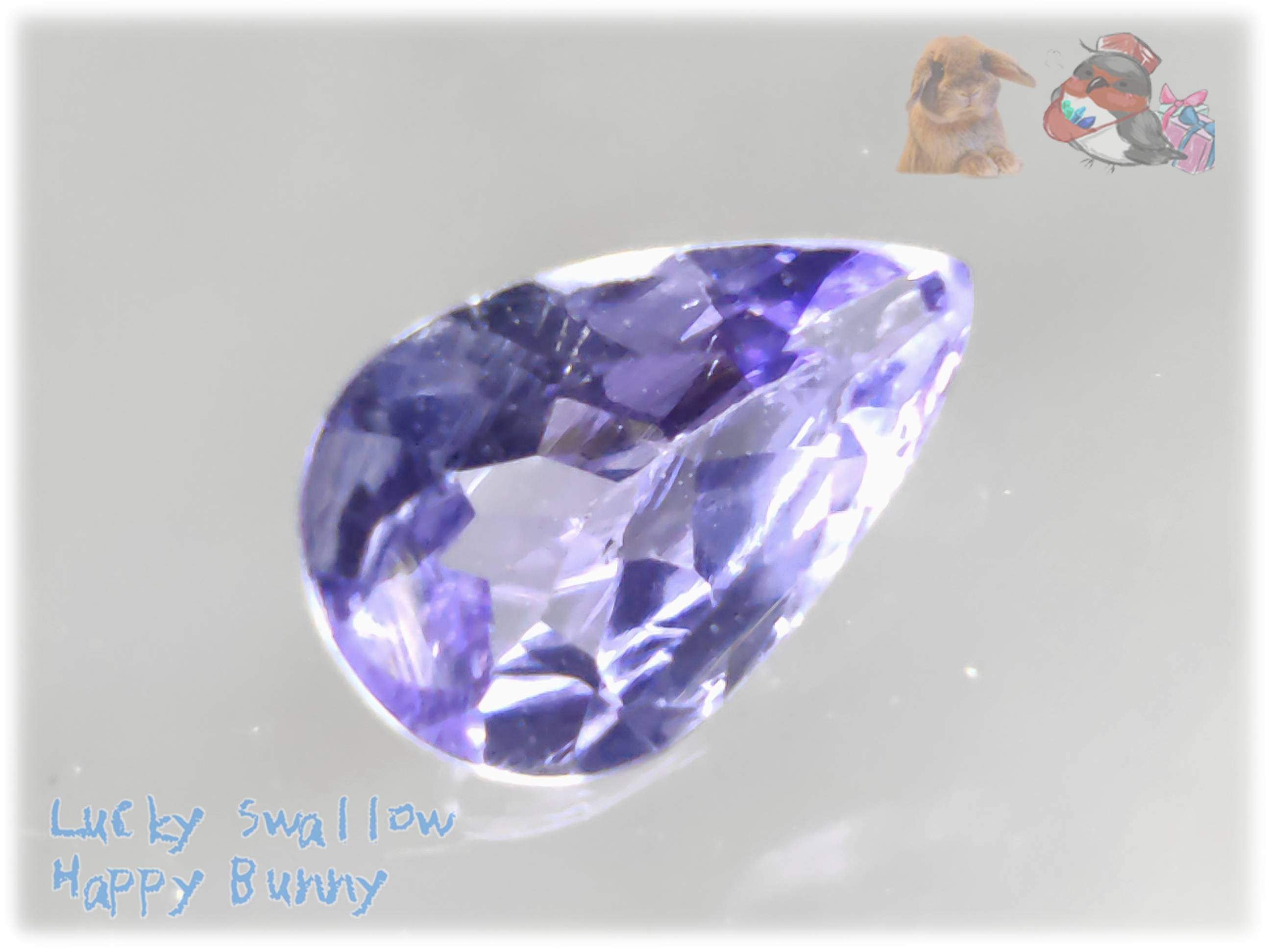 ゾイサイト タンザニア産　約 6.2 x 3.9 mm　0.33cts　自然光+レフ版　ピンクパープル　No.5791