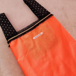 霓虹橙色環保袋便利店午餐尺寸 第3張的照片