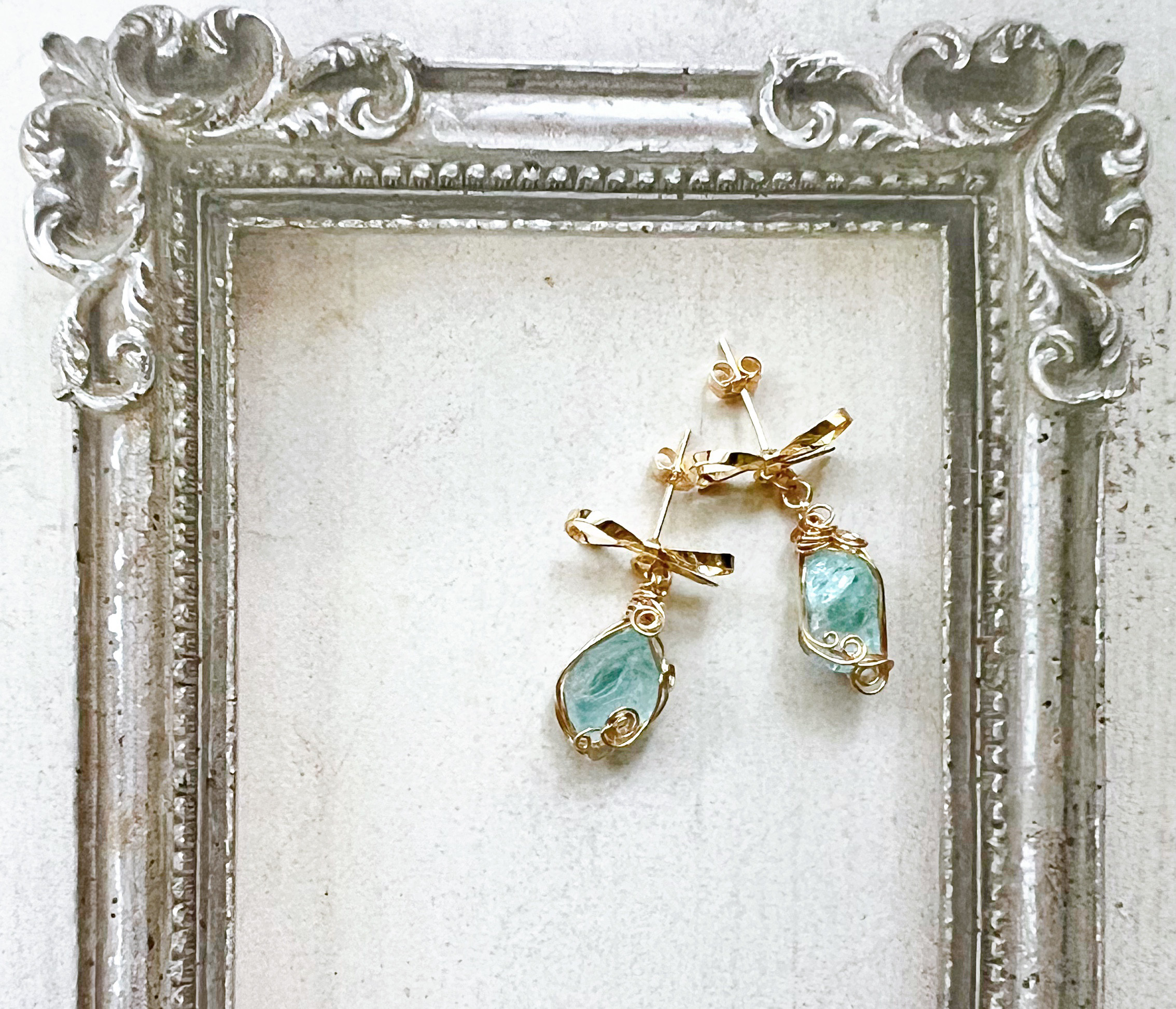 スイスブルートパーズ　14kgfリボンピアス