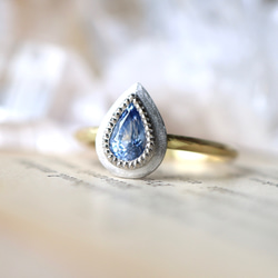 ペアシェイプのブルーサファイアK10粒々アシメミル打ちシルバーリング約9.5号 ペアシェイプのブルーサファイアK10粒々アシメミル打ちシルバーリング