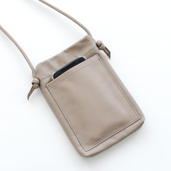 真皮智慧型手機肩挎粉筆皮革手袋，也可用作助手袋，內部布料（坯布）。 第12張的照片
