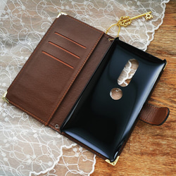 手帳型スマホカバー『月夜の兎と木苺』マットな黒 うさぎが持つ赤い実がキラリ！ほぼ全機種対応◎ギフトラッピング対応 4枚目の画像