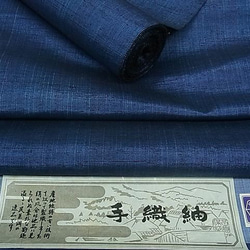 細い縞柄の紬と大島紬亀甲でお作りいたしました大人の半幅帯です．軽量．長尺です． 6枚目の画像