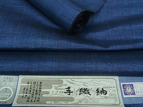 細い縞柄の紬と大島紬亀甲でお作りいたしました大人の半幅帯です．軽量．長尺です． 6枚目の画像