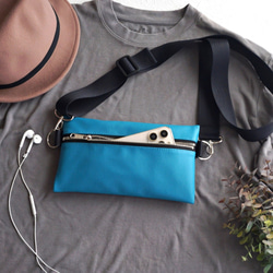 2WAY 厚帶合成皮革單肩包 [孔雀藍] 智慧型手機袋 Sacoche 生態皮革 第1張的照片