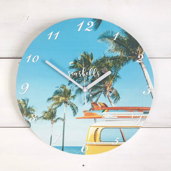 ハワイアンフォト時計 スターフィッシュの壁掛け時計 貝殻とヒトデのプリント ラウンドクロック 丸型 見やすい時計 1枚目の画像
