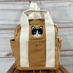 【送料無料】白黒猫の刺繍 たっぷりポケット付き Zip式 キャンバスミニリュック 6枚目の画像