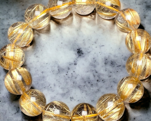 美品✨ジュエリーSHOPで購入 タイチンルチルクォーツブレス約7.0㎜ タイチンルチルクォーツ[1Rv8]キャッツアイ猫目 特大珠15.4mm 虹入り超