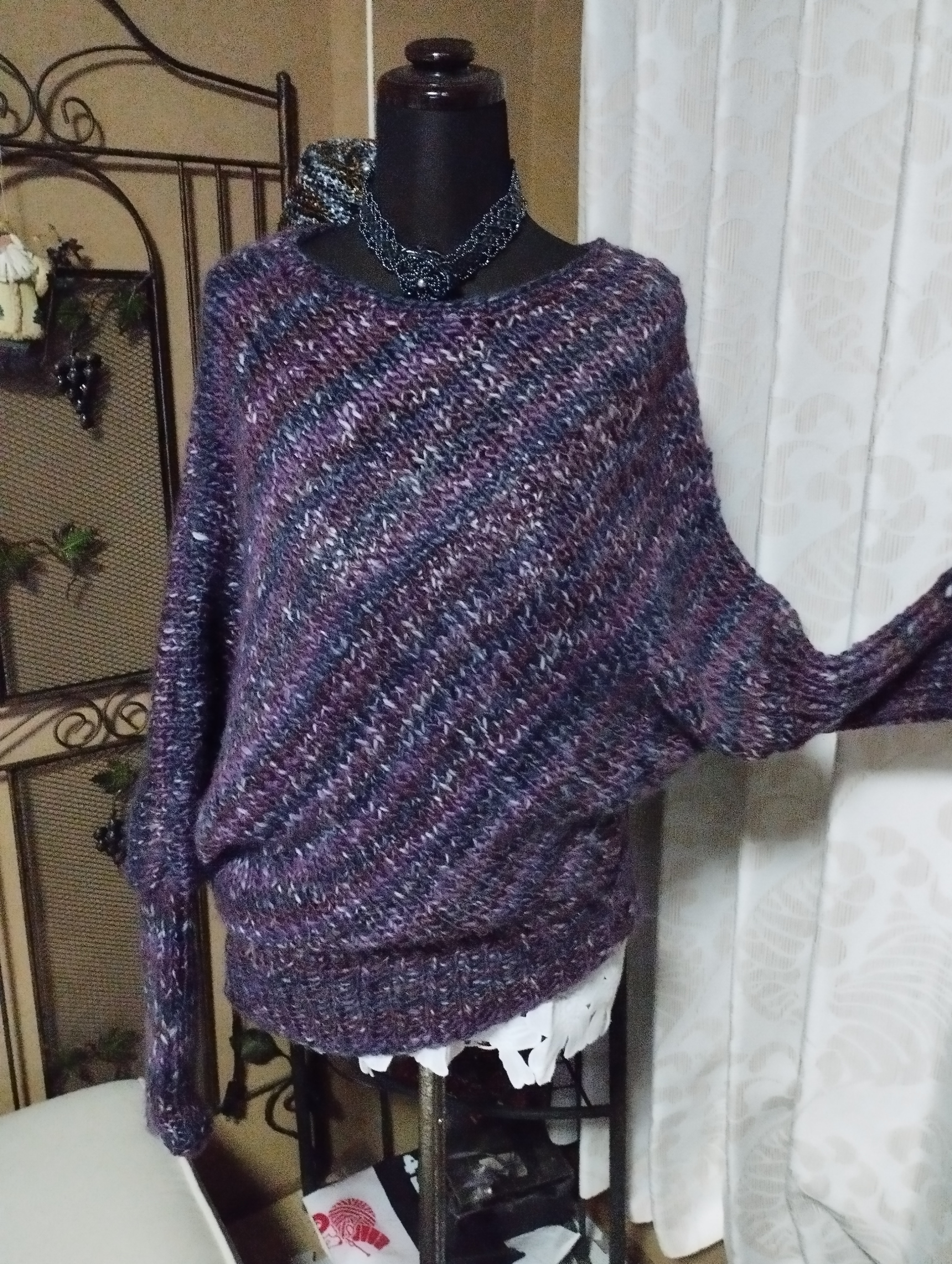 パープル系のミックスカラーのプルオーバー