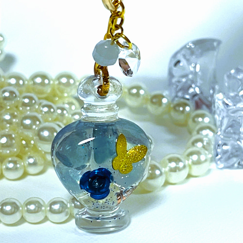 【N.568】ハンドメイドネックレス　オルゴナイト　薔薇　蝶　アクアマリン N.568】ハンドメイドネックレスオルゴナイト薔薇蝶アクアマリン