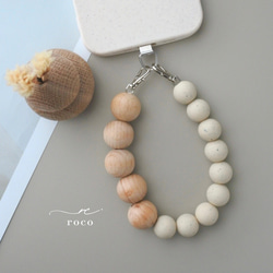 ハンドストラップ　スマホストラップ　ウッド　ストラップ　ストラップホルダー　木　スマホ　ウッドビーズ　手首　落下防止 1枚目の画像