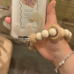 ハンドストラップ　スマホストラップ　ウッド　ストラップ　ストラップホルダー　木　スマホ　ウッドビーズ　手首　落下防止 19枚目の画像