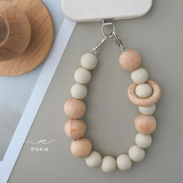 ハンドストラップ　スマホストラップ　ウッド　ストラップ　ストラップホルダー　木　スマホ　ウッドビーズ　手首　落下防止 1枚目の画像