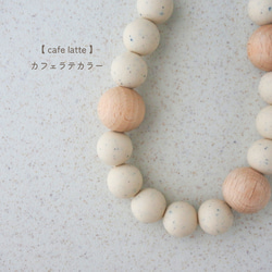 ハンドストラップ　スマホストラップ　ウッド　ストラップ　ストラップホルダー　木　スマホ　ウッドビーズ　手首　落下防止 2枚目の画像