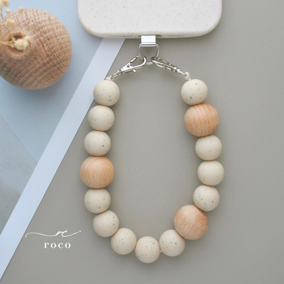 ハンドストラップ　スマホストラップ　ウッド　ストラップ　ストラップホルダー　木　スマホ　ウッドビーズ　手首　落下防止 1枚目の画像