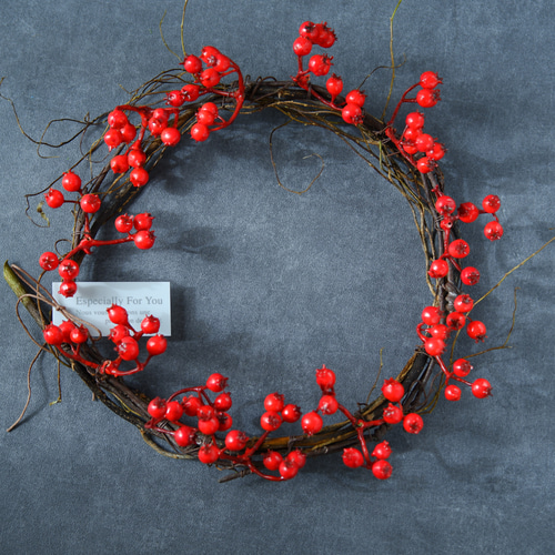 再販》☆クリスマスにもお正月にも☆サンキライと雲竜柳のリース