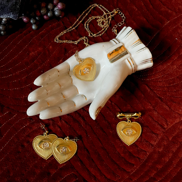 光る金の眼 アンティーク風 ブローチ ピアス ネックレス ネックレス 