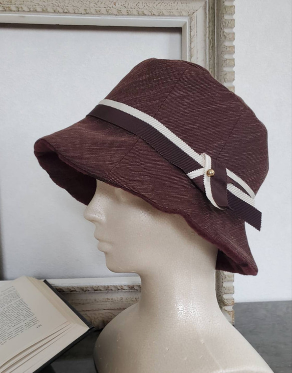 纏う…装いの帽子【ブリムとクラウンが繋がったデザインのクロッシェ】シンプルでスタイリッシュなシルエット。 1枚目の画像
