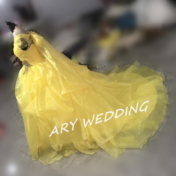 高品質！黃色洋裝露肩可愛公主線柔軟分層薄紗裙新娘 第5張的照片