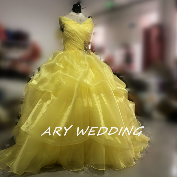 高品質！黃色洋裝露肩可愛公主線柔軟分層薄紗裙新娘 第2張的照片