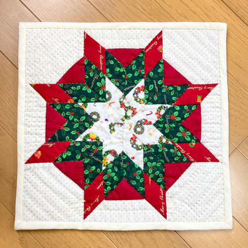 b.クリスマスのブレイジングスターのパッチワークタペストリー