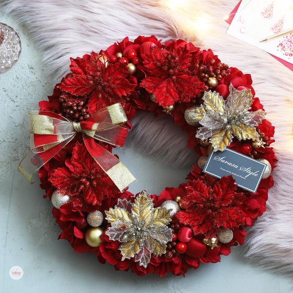 海外コストコ　クリスマスリース ポインセチア レッド コストコのクリスマスリースはベルベット調のポインセチアが際立つ