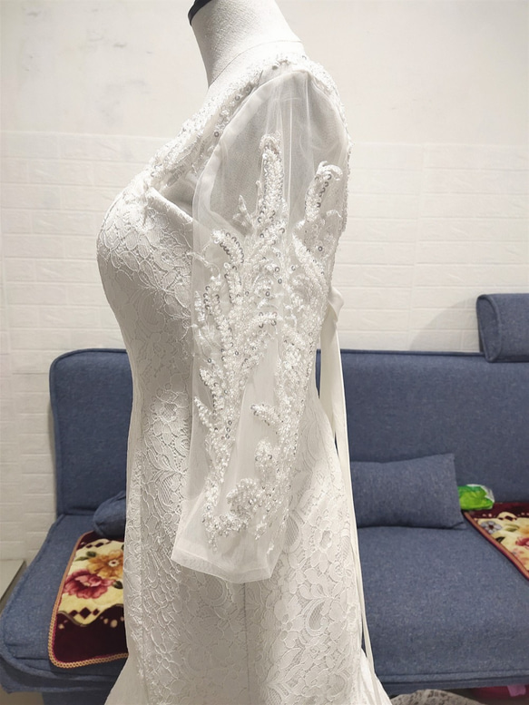 美容產品！婚紗白色蕾絲令人垂涎的禮服優雅純粹的美麗 第2張的照片