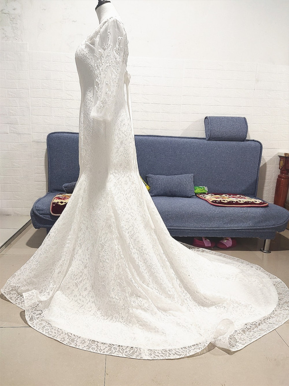 美容產品！婚紗白色蕾絲令人垂涎的禮服優雅純粹的美麗 第7張的照片