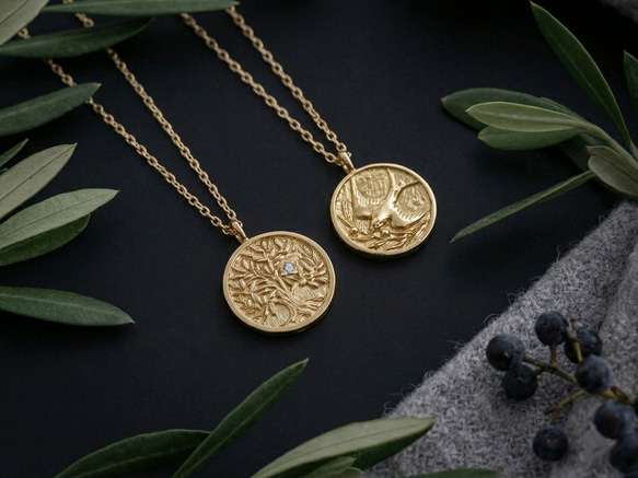 K18 YG】ダイヤモンドと金のオリーブとツバメのリバーシブルコイン 
