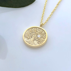 [K18 YG] 鑽石和金色橄欖和燕子雙面硬幣項鍊 第3張的照片