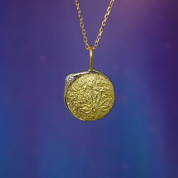 日食の首飾り（K10 Pt900 ダイヤモンド） 1枚目の画像