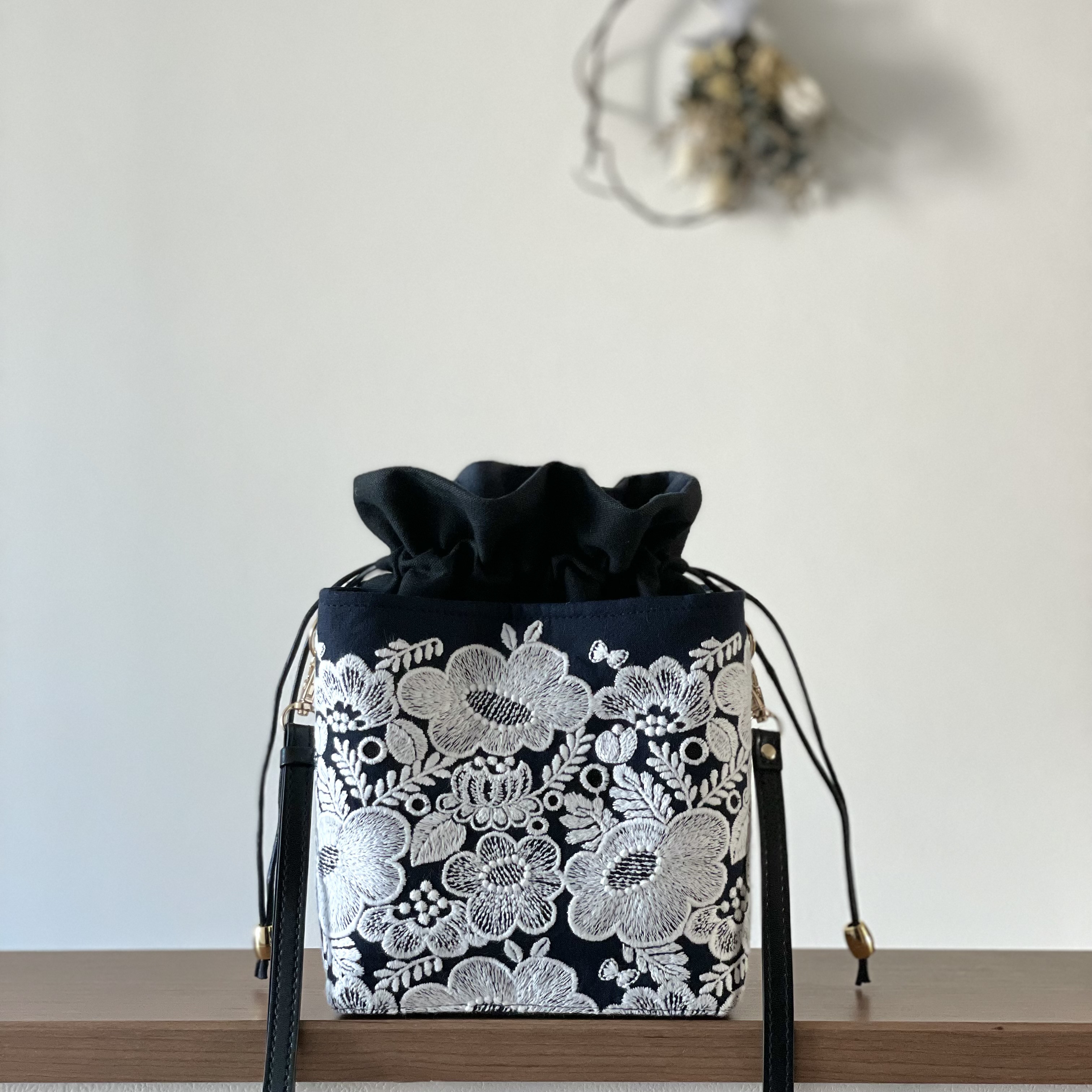 ⚮̈ミナペルホネン smile flower navy ネリオバッグ あおり巾着  