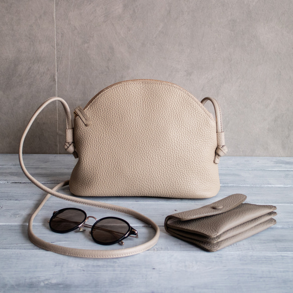 高品質真皮手拿包，簡約迷你包，小巧精緻，優雅大方，適合成人[米色] 第2張的照片