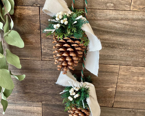 松ぼっくりのグリーンリース 特大松ぼっくりの壁飾り 秋冬グリーンインテリア プリザーブドフラワー