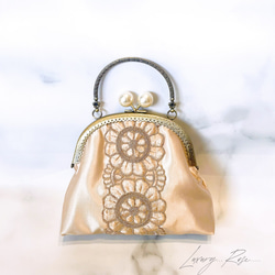 新作シャンパンゴールドとっても愛らしいシルエットフランスレースのがま口ミニバッグ　コンパクトバッグ　フォーマルバッグ 2枚目の画像