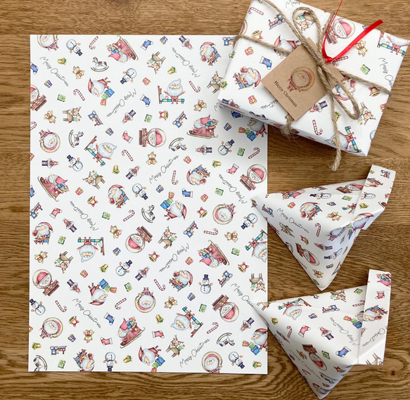 デザインペーパー【サンタのクリスマス】　A4  10枚　包装紙　ラッピングペーパー 1枚目の画像