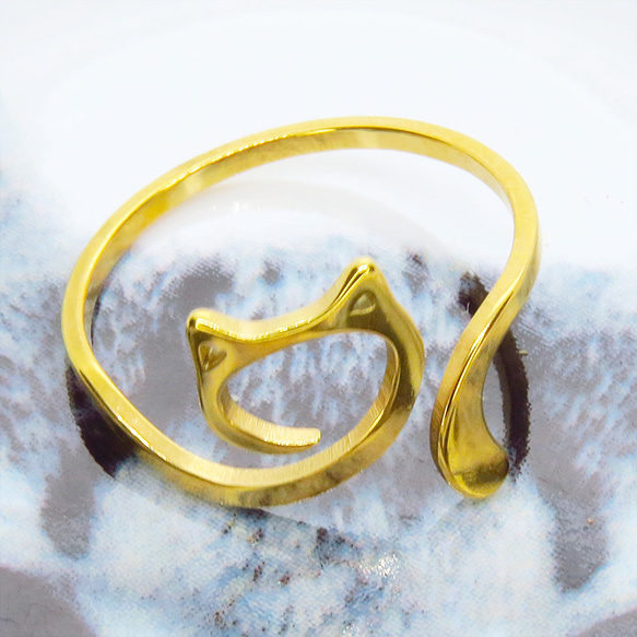 【再販】ステンレス製 ゴールドカラー 柔らかい曲線の猫フェイスシルエットモチーフのリング フリーサイズ 9枚目の画像