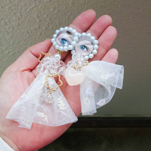 目のめまい 白いレース ピアス イヤリング 目 目玉 刺繍リボン リボン 