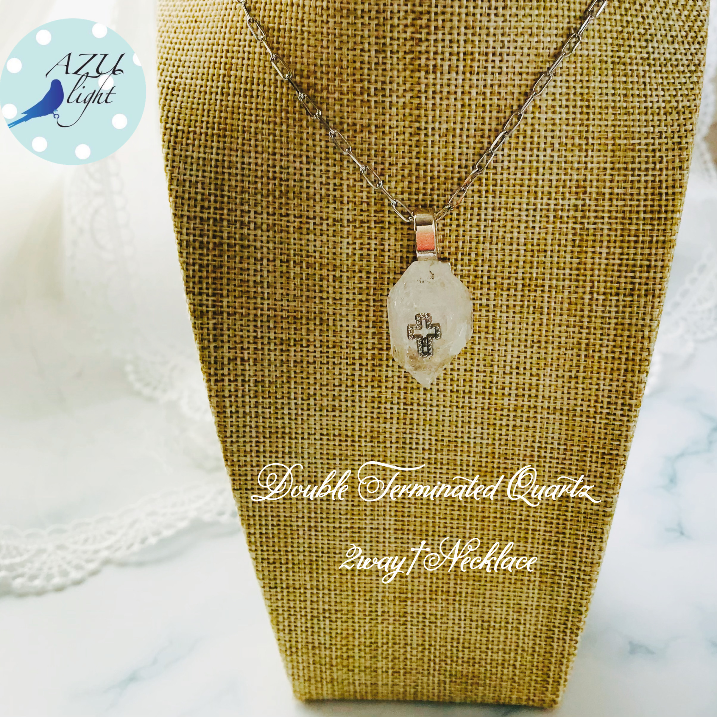 2way【4月誕生石✴︎全てを清め浄化し活性化させる✴︎癒し】クロスモチーフ付きダブルポイント水晶×羽の真鍮ネックレス 5,180円